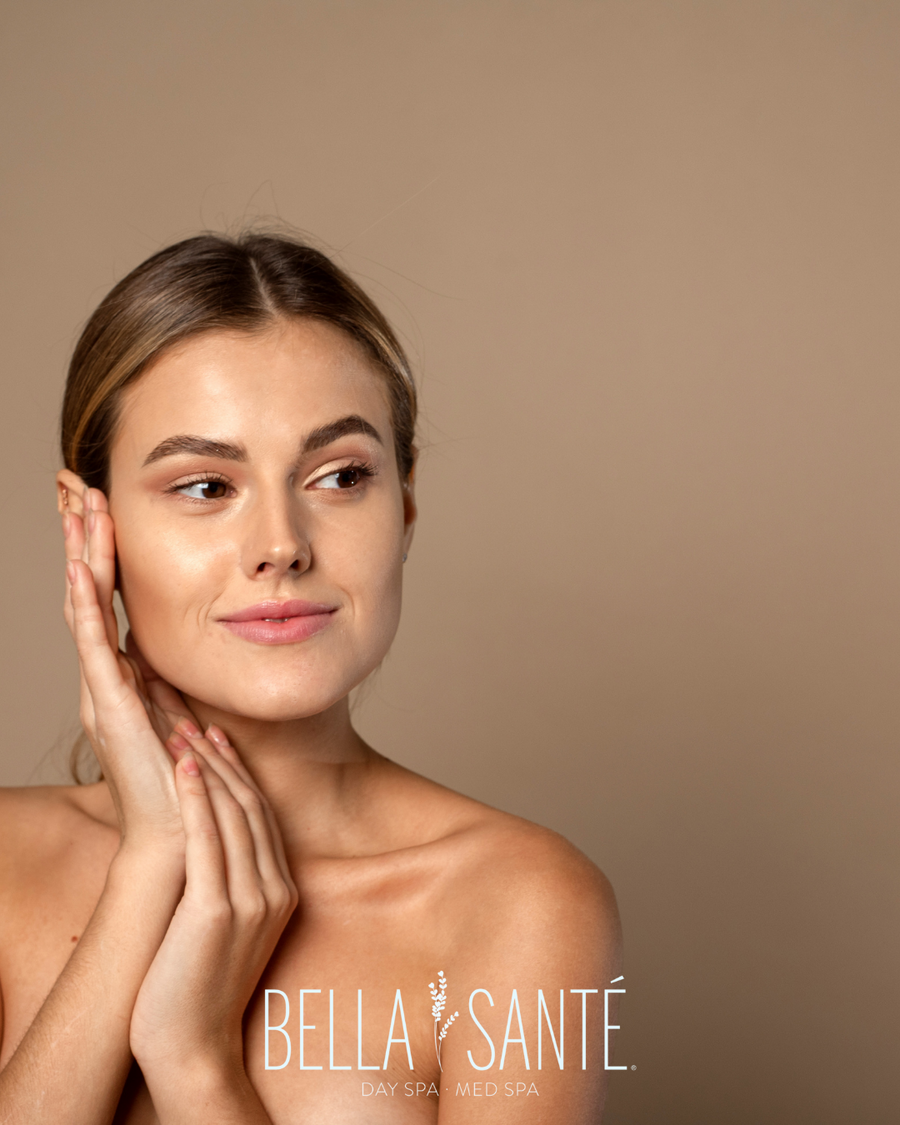 Woman depicted from the shoulders up, learn more about treating hyperpigmentation at Bella Sante spa.