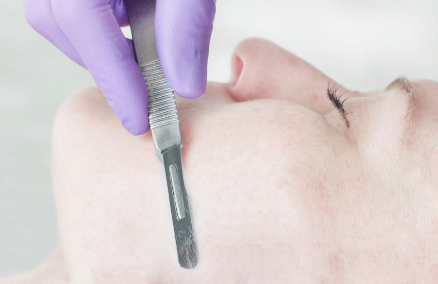 Guest receiving a dermaplaning treatment at a our med spa. 