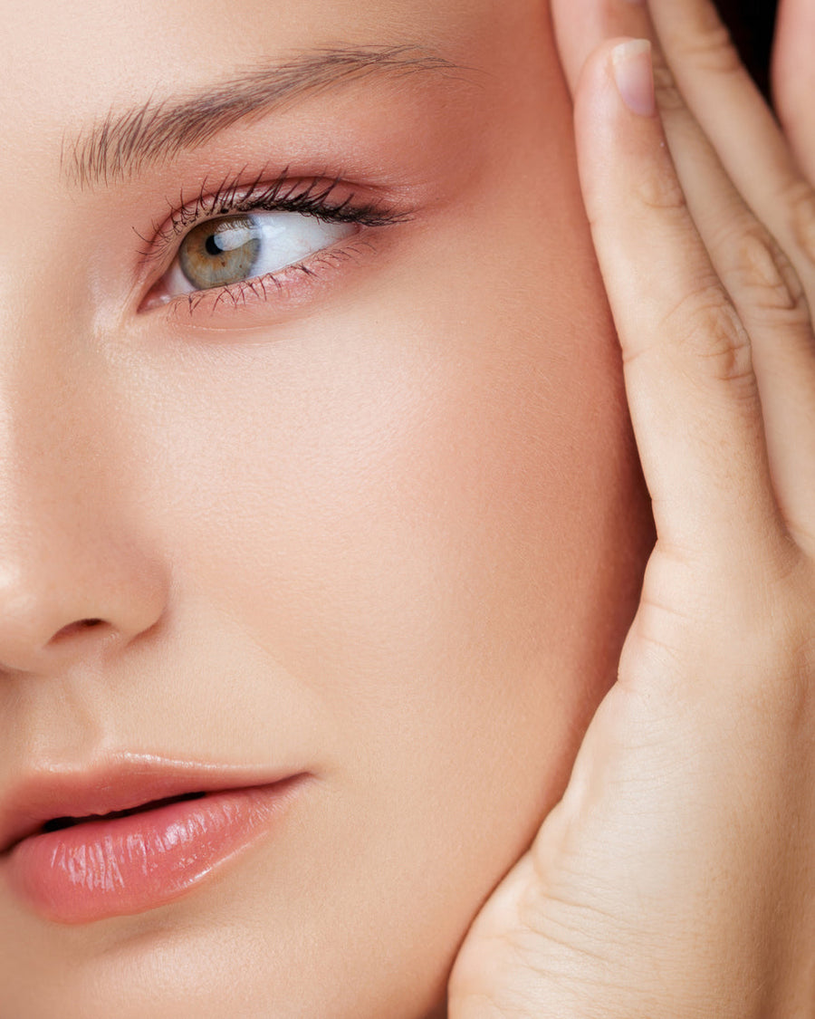 Fresh-faced woman with smooth skin, minimal routine