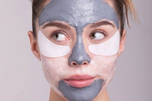 Image of a face of a teen girl with a face masque and face patches on her face at our award winning spa.