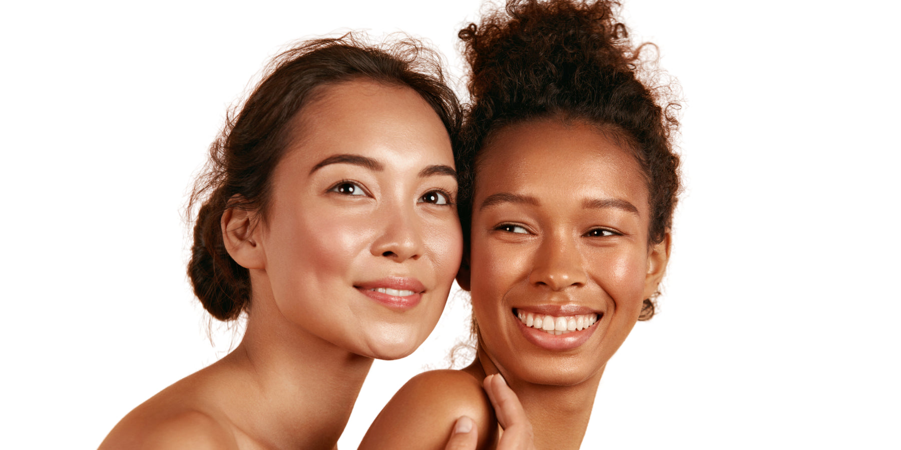 Image of two women with glowing skin smiling together. Click on link to go to navigate to online booking and schedule an appointment at any time from anywhere.